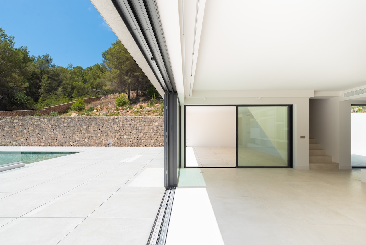 Resa Estates Ibiza for sale newbuilt villa Roca Llisa luxury elevator sliding doors modern.jpg